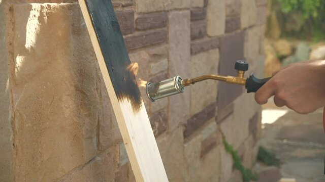Making Charred Wood With Torch, Slow Motion, Close Up