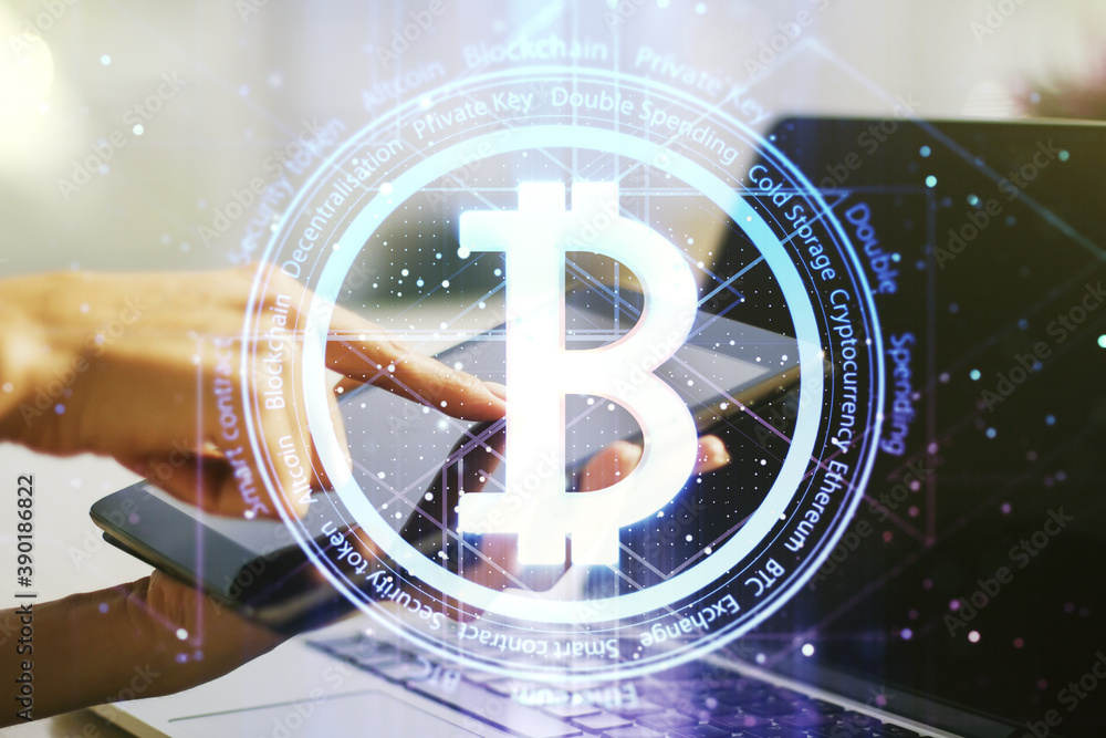 Poster double exposure of creative bitcoin symbol hologram and hand working with a digital tablet on backgr