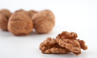 Walnuts in close-up, isolated on a white background.Space for text