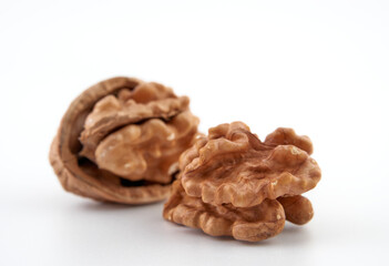 Walnuts in close-up, isolated on a white background.Space for text
