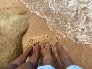 feet on the beach