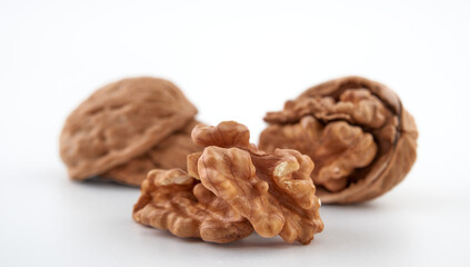 Walnuts in close-up, isolated on a white background.Space for text