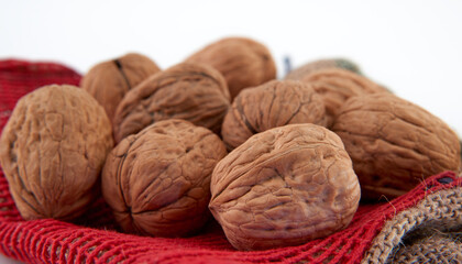 Walnuts in close-up, isolated on a white background.Space for text