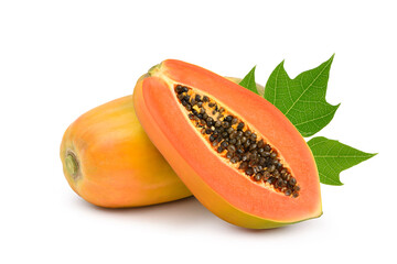 Ripe papaya fruit with cut in half and green leaf isolated on white background.