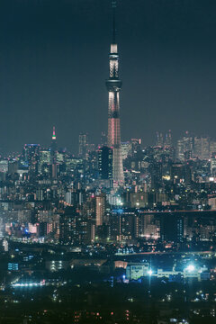 View of Tokyo Skytree tower in city at night
