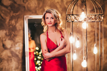 girl in a red dress near the loft of lights