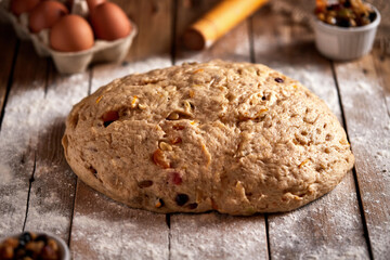 Stollen dough, traditional German Christmas stuffed with raisins and candied fruit