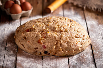 Stollen dough, traditional German Christmas stuffed with raisins and candied fruit