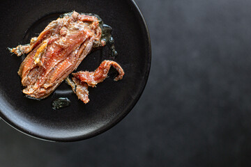 anchovies canned fish in a tin can seafood top view copy space for text food background rustic