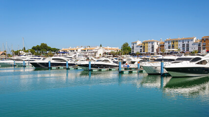 Fototapeta na wymiar Luxury yachts in the port of Vilamoura in Portugal