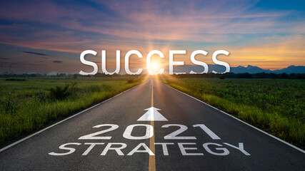 New year 2021 or start straight concept.word 2021 and strategy written on the road of asphalt road...