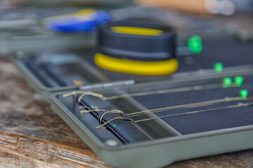 Fishing tackle on a wooden table.Carp fishing.carp fishing tool.