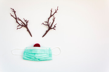 Christmas reindeer concept with protective face mask