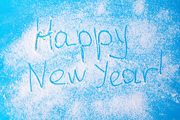 Merry Christmas and happy New year .Snow background with the inscription Happy new year. The view from the top.