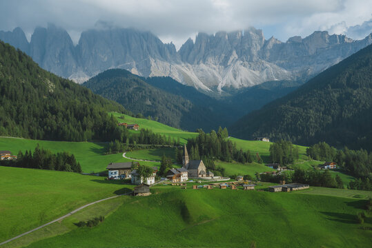 Italy, South Tyrol, Funes, Santa Magdalena, Landscape with village in valley
