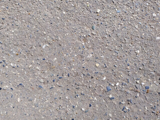Rough texture of stone and cement for backgrounds and wallpaper with empty space for text and design