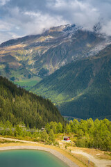European mountains Mont Blanc, France. Near the town of Chamonix, Haute-Savoie. A beautiful emerald mountain lake.