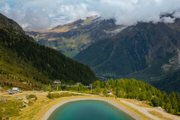 European mountains Mont Blanc, France. Near the town of Chamonix, Haute-Savoie. A beautiful emerald mountain lake.
