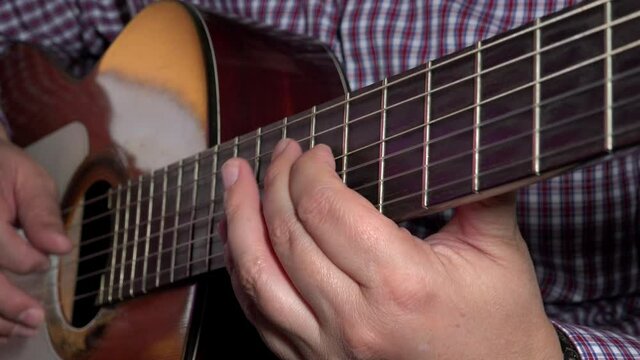 Guitarist playing the classical guitar