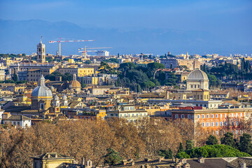 Beautiful panoramic view from above of historical area of Rome at sunset. Rome, Italy.