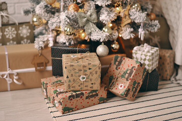 A new year interior in boho style, gifts under the christmas tree