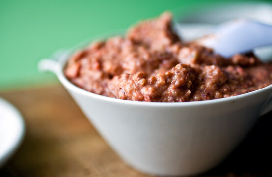 Close up of red bean and pepper pate in bowl