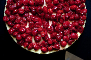 Overhead view of creme fraiche cheesecake with sour cherries