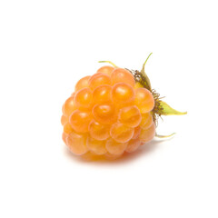 Yellow raspberry with leaves on a white background