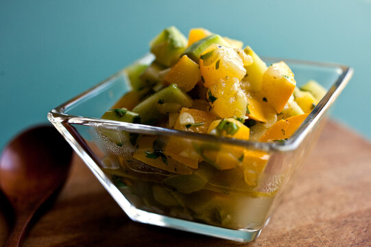 Close up of cumin scented summer squash salad in bowl