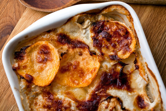 Close Up Of Root Vegetable Gratin On Table