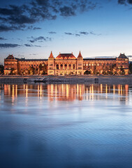 View on the riverbank of Budapest with the Budapest University of Technology and Economic at night