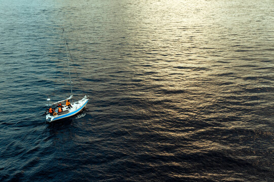 marine rescue boat sailing on the water on the sunset