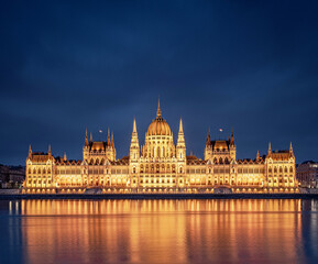Fototapeta na wymiar Hungarian Parliament at night with river Danube