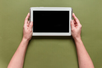 Top view of a flat lay of desktop and notepads for writing down goals and plans. 2021 New Year's goal, plan, action text on notepad with office accessories. Business motivation, inspiration concept.