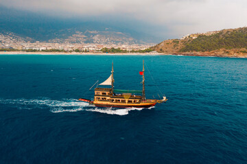 Sailboat in the sea on a beautiful day, luxury summer adventure, active vacation in Mediterranean sea, Turkey