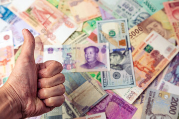 Thumbs up and money. money is good