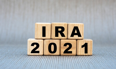 IRA 2021 - word on wooden cubes on a gray background