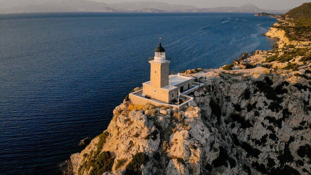 Aerial photo of Melagavi Lighthouse at Sunset , Loutraki Greece