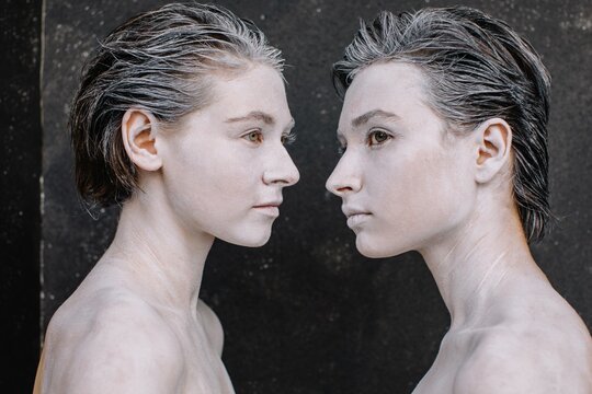 Models with white skin in front of each other