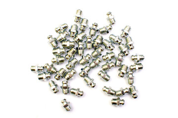 Grease nipple fittings for machine spare parts isolated on the white background. New spare parts.