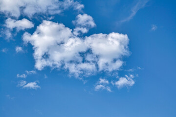 Naklejka na ściany i meble Blue sky with cumulus clouds. Cumulus clouds in the blue sky. Beautiful clouds in the blue sky background.