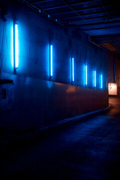 underground tunnel full of neons