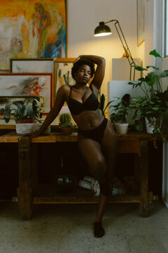 Beautiful afro plus-size woman in underwear.