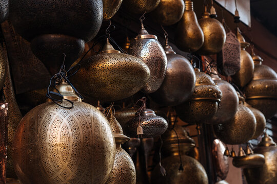 Beautiful shiny ancient vessels hanging for sale