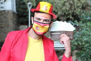 Spanish businessman with full wallet during pandemic 