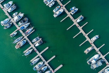 Boats and yachts penned in marina