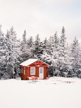 A snowy ski patrol shack at a ski resort.