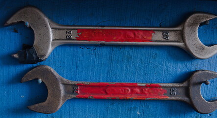 wrench on red