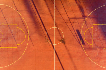 Aerial views over urban basketball and tennis sports hardcourts