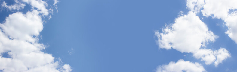 White clouds in the blue sky. Danney for design. Sunny sky banner